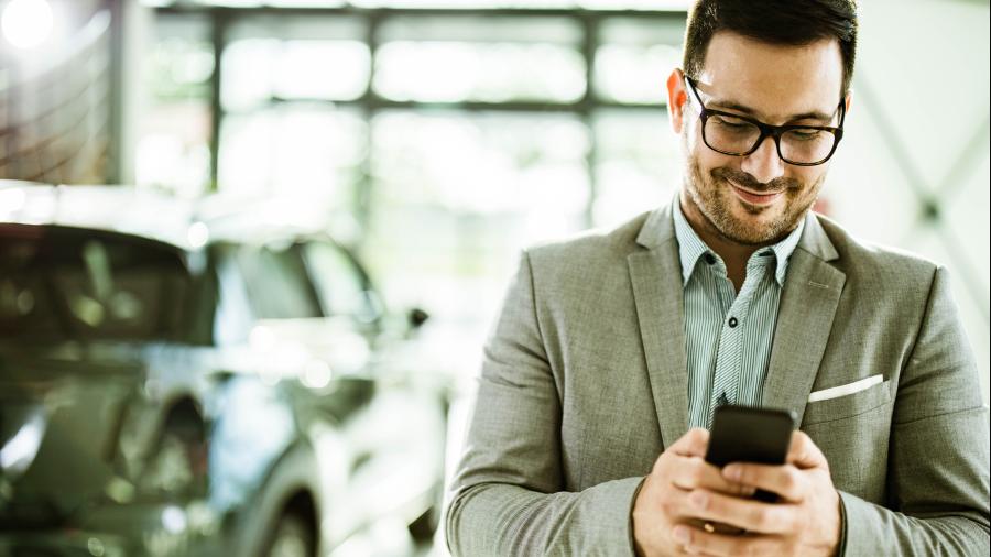 man using app on his phone for travel